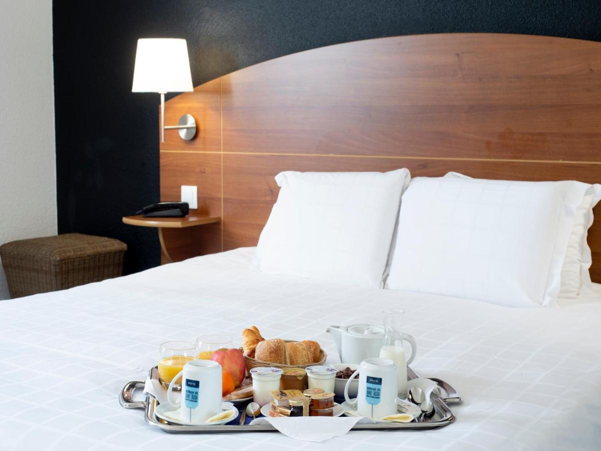 Kyriad Hotel Clermont Ferrand Centre Bagian luar foto
